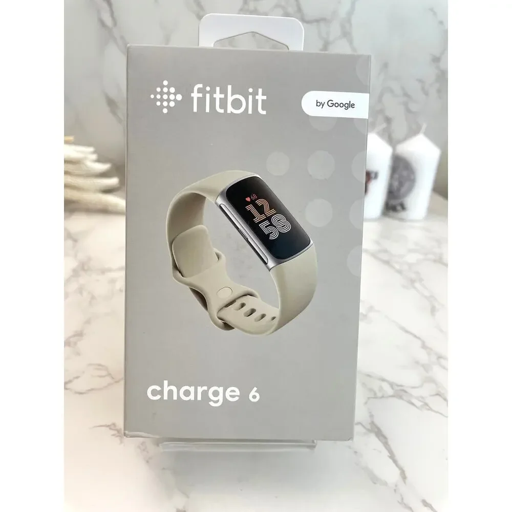 Fitbit Charge 6 tracker in Porcelain/ Silver Aluminum NIB